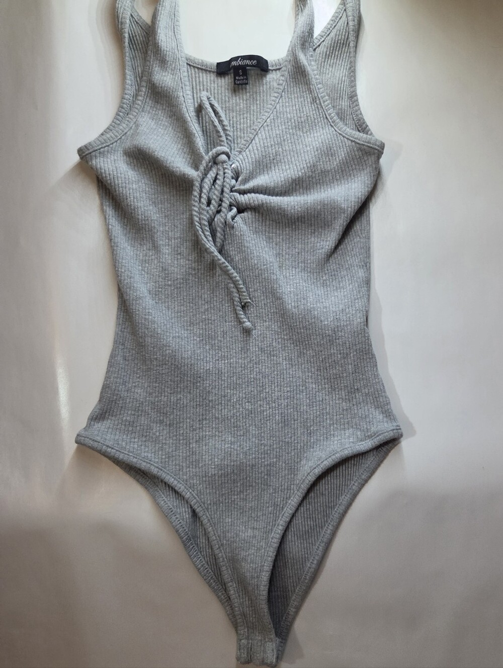 Small grqy bodysuit